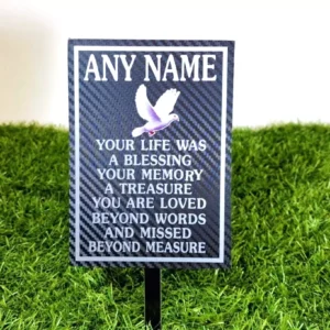 Outdoor personalised memory plaque placed in UK memorial garden setting