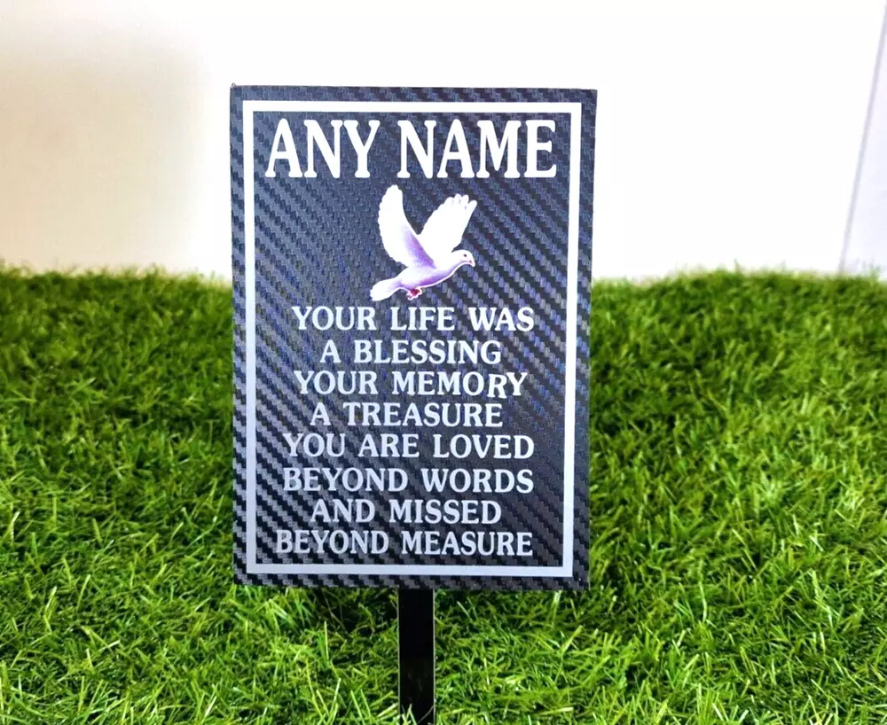 Outdoor personalised memory plaque placed in UK memorial garden setting