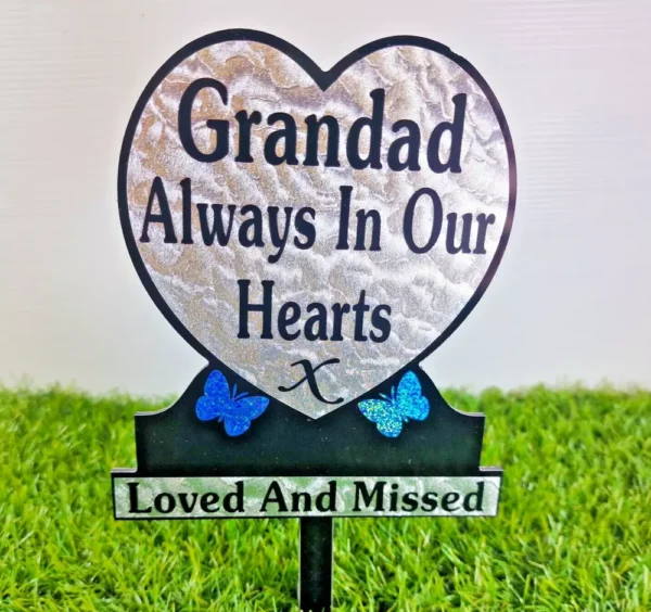Heart-shaped memorial plaque for grandad on a UK gravesite