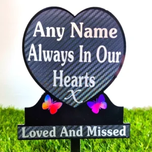 Personalised Memorial Gift Plaque Grave Heart engraved with name and dates placed on a graveside