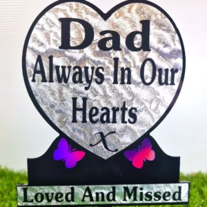 Dad Heart-Shaped Memorial Plaque for Grave in natural stone finish placed at a cemetery