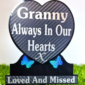 Heart-shaped granny memorial plaque on grave, engraved with name and dates