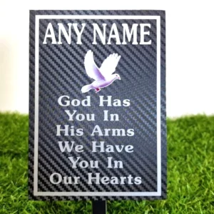 Weatherproof memorial plaque displayed in a garden with custom message