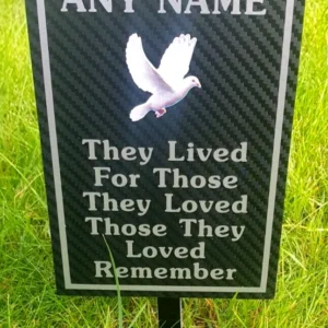 Personalised silver memorial plaque engraved with name and dates, polished finish, suitable for garden or memorial wall use