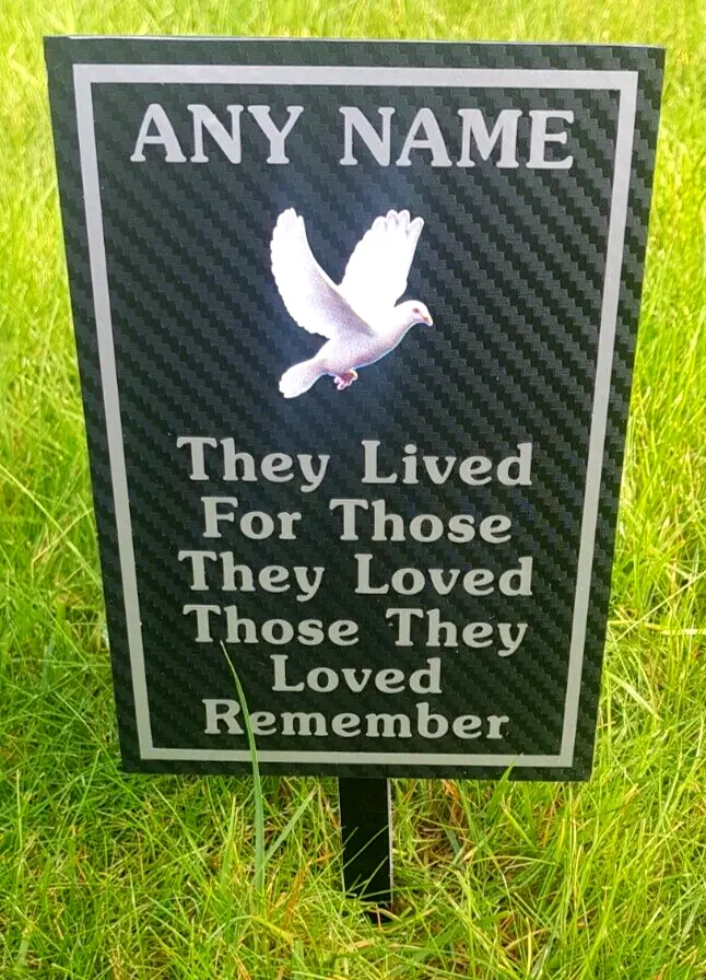 Personalised silver memorial plaque engraved with name and dates, polished finish, suitable for garden or memorial wall use